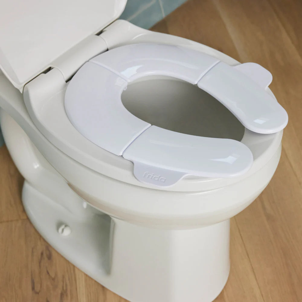 Frida Baby - Zložljiv nastavek za WC školjko